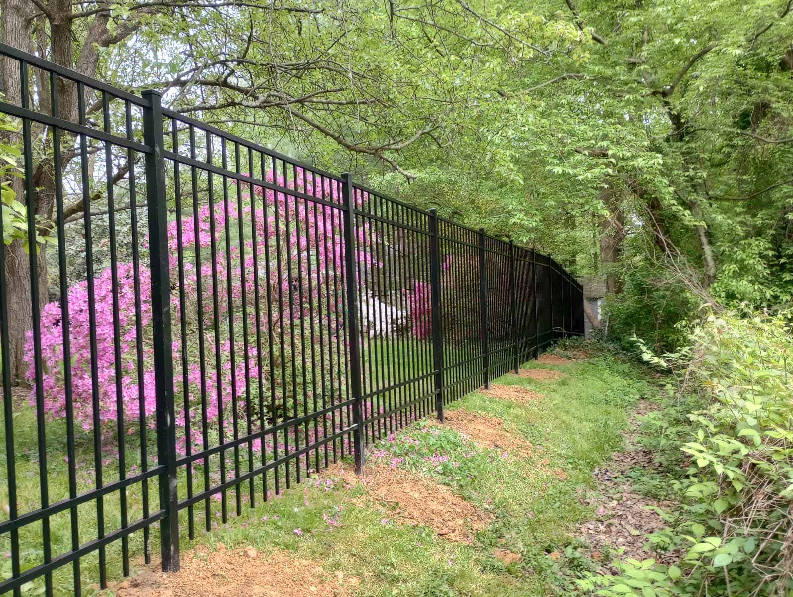 Aluminum fence installed by Emperor Fence LLC