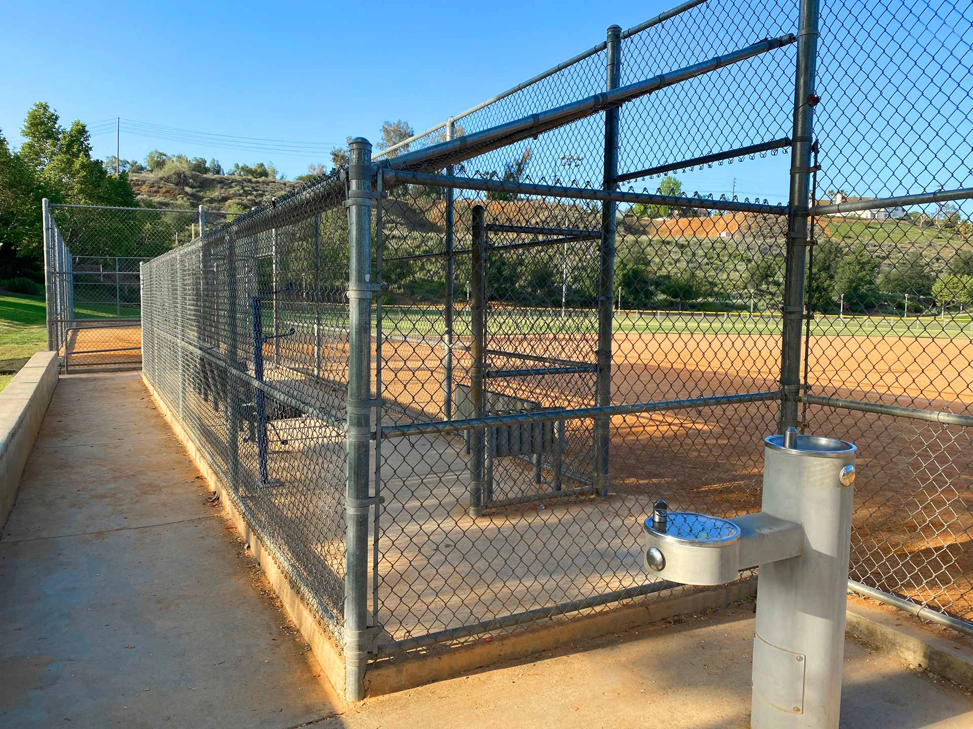Chain link fence surrounding a baseball field