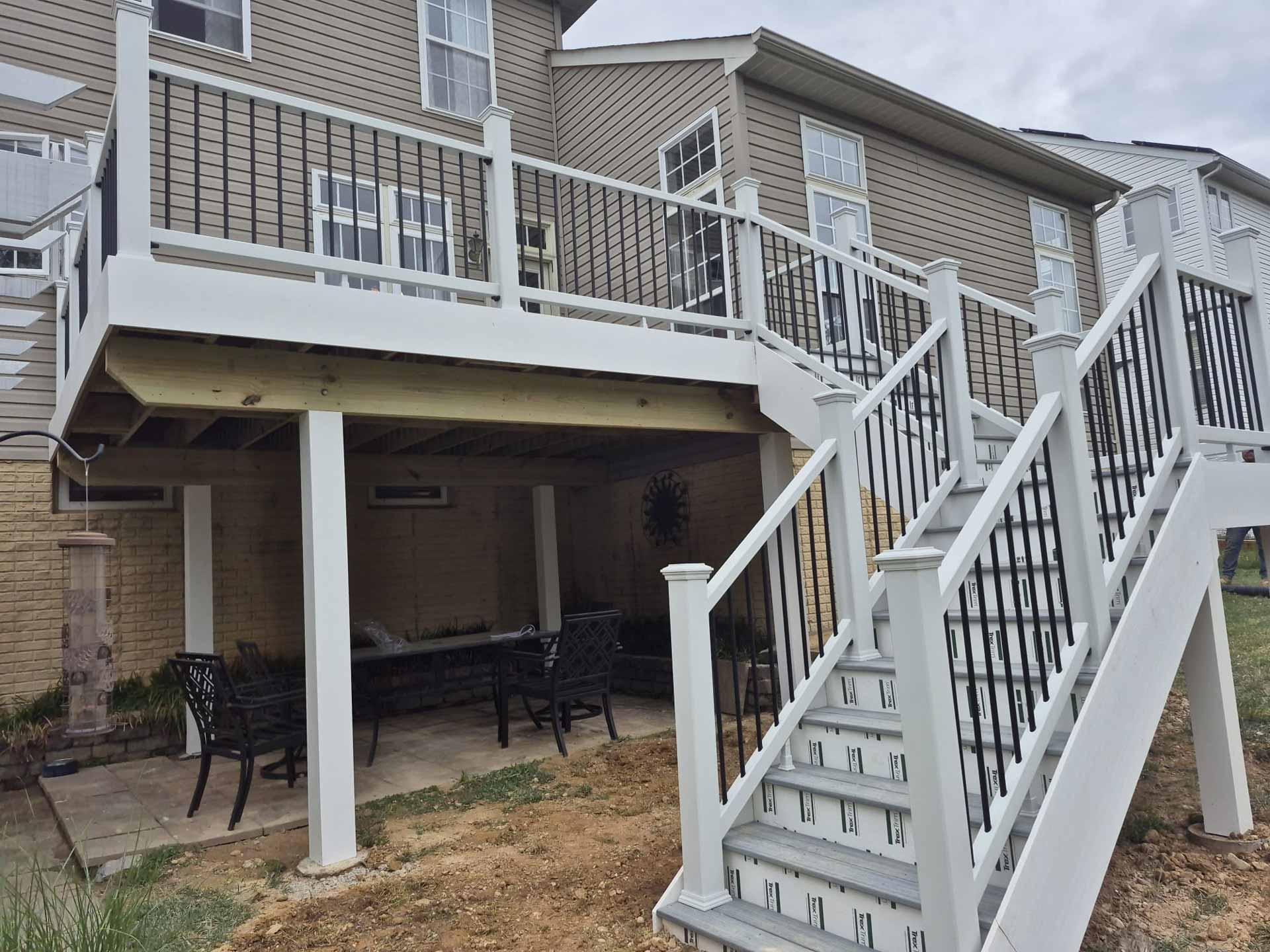 Deck and stairs installed by Emperor Fence LLC