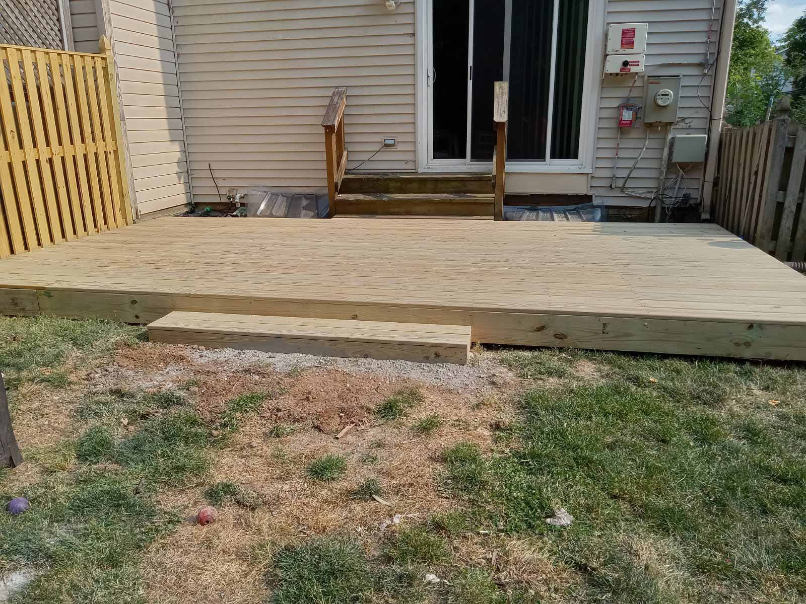 Wooden deck built by Emperor Fence LLC