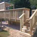 Wooden pool deck installed by Emperor Fence LLC