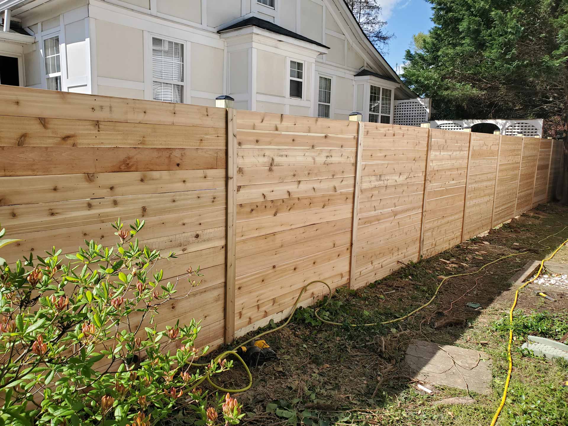 Wooden privacy fence built by Emperor Fence LLC
