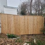Wooden privacy fence installed by Emperor Fence LLC
