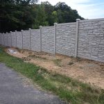 Decorative stone fence installed by Emperor Fence LLC
