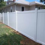 White vinyl privacy fence installed by Emperor Fence LLC