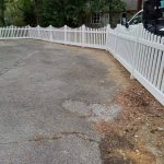 Decorative white vinyl fence installed by Emperor Fence LLC
