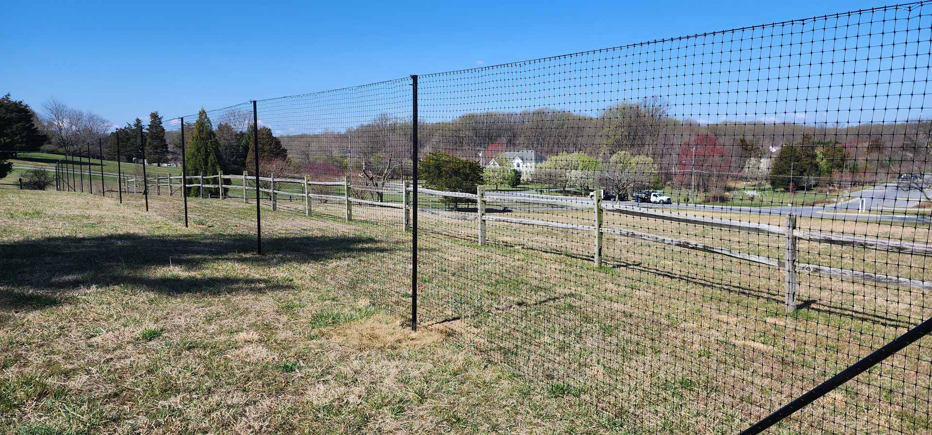 Wire fence installed by Emperor Fence LLC