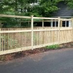Wooden fence installed by Emperor Fence LLC