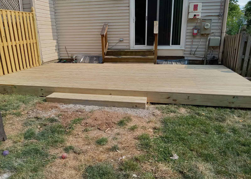 Wooden deck built by Emperor Fence LLC