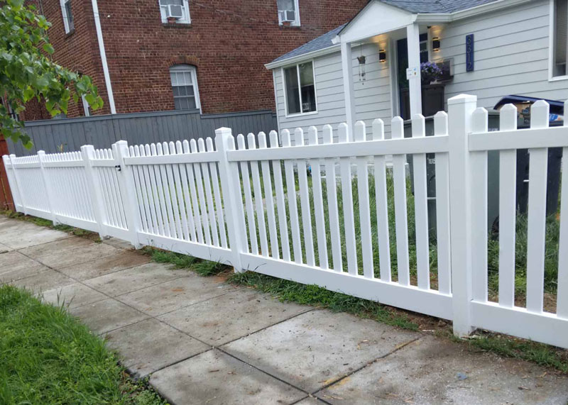 White vinyl fence built by Emperor Fence LLC