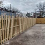 Wooden fence installed by Emperor Fence LLC