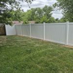 White vinyl privacy fence installed by Emperor Fence LLC