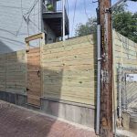 Wooden fence with gate, built by Emperor Fence LLC