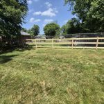New wooden fence installed by Emperor Fence, LLC