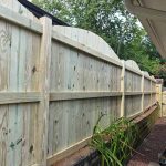 New wooden privacy fence installed by Emperor Fence, LLC